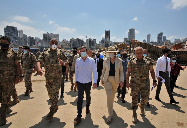 U.S. Undersecretary of State for Political Affairs David Hale, center left, and U.S. Ambassador to Lebanon Dorothy Shea, center right, visit the site of the Aug. 4 explosion in Beirut, Lebanon, Saturday, Aug. 15, 2020. (Nabil Monzer/Pool Photo via AP)
