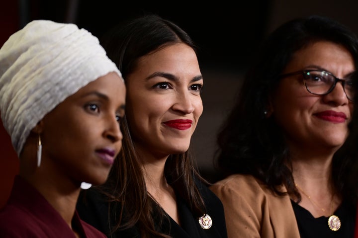 Reps. Ilhan Omar (D-Minn.), from left, Alexandria Ocasio-Cortez (D-N.Y.) and Rashida Tlaib (D-Mich.) hold a news conference after Democrats in the U.S. Congress moved to formally condemn President Donald Trump's attacks on the four minority congresswomen in Washington on July 15, 2019.