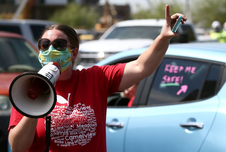 At a protest in Phoenix last month, Arizona teachers voiced fears about returning to school in a state that continues to be r