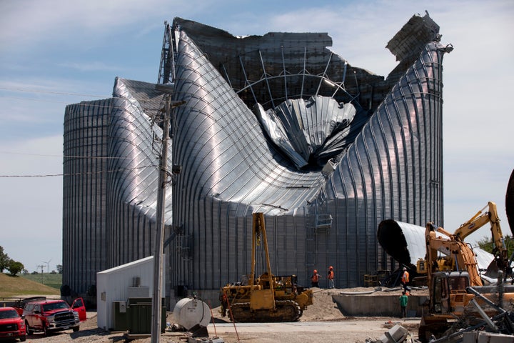 Grain bins at the Heartland Co-Op grain elevator in Malcom, Iowa, were damaged by a powerful storm that swept through Io