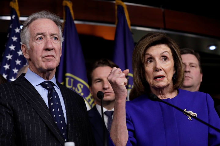 Neal (left) stands alongside House Speaker Nancy Pelosi. The speaker, who has endorsed the congressman, is featured in one of his ads.