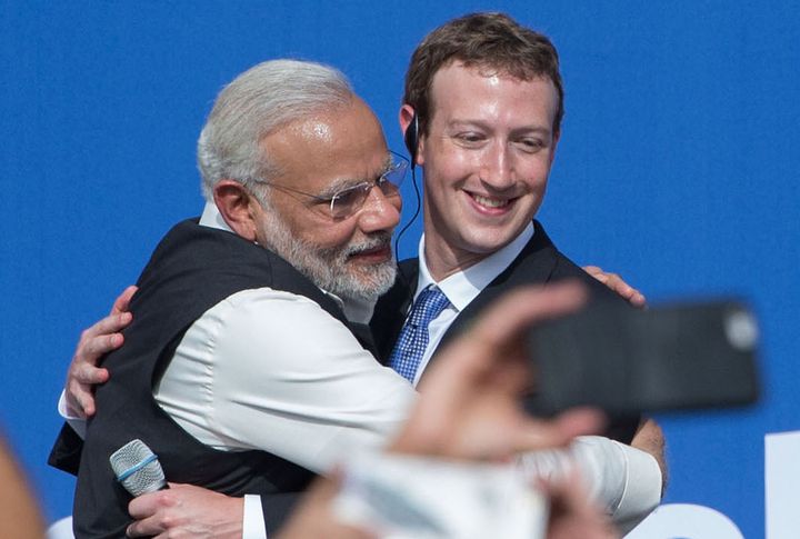 Prime Minister Narendra Modi and Facebook CEO Mark Zuckerberg hug after a Townhall meeting, at Facebook headquarters in Menlo Park, California, on September 27, 2015.