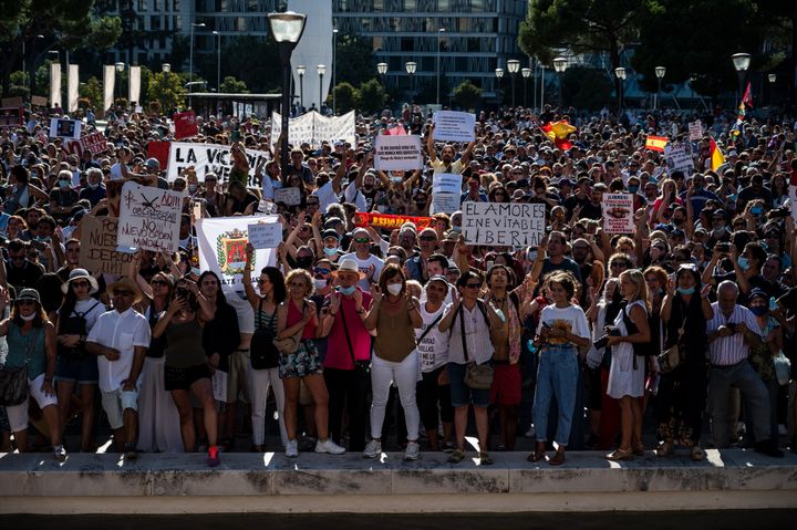 Protesters in Madrid rally against the mandatory use of face masks and other measures adopted by the Spanish government to prevent the spread of coronavirus, Aug. 16.