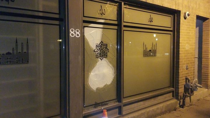 A broken window at Masjid Toronto on Adelaide St. 