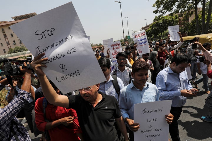 Members of the media protest against the arrest of journalists for allegedly posting defamatory content on social media against CM Yogi Adityanath on June 10, 2019 in New Delhi.