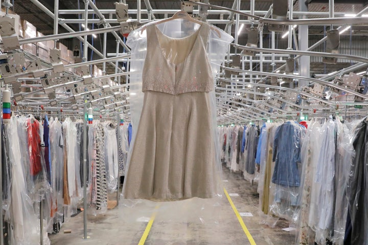 A garment hangs in the automated sortation section at Rent the Runway's "Dream Fulfillment Center" in Secaucus, NJ in September 2019.