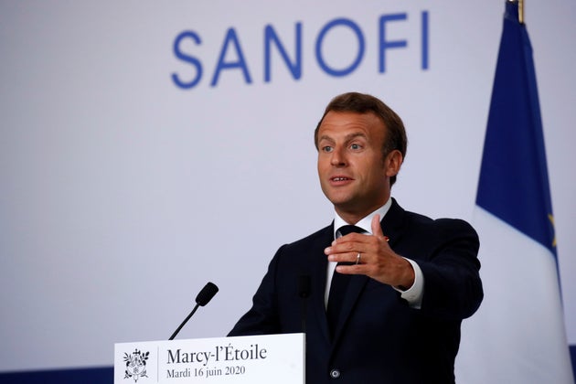 French President Emmanuel Macron delivers a speech after visiting the Sanofi pharmaceutical plant near...