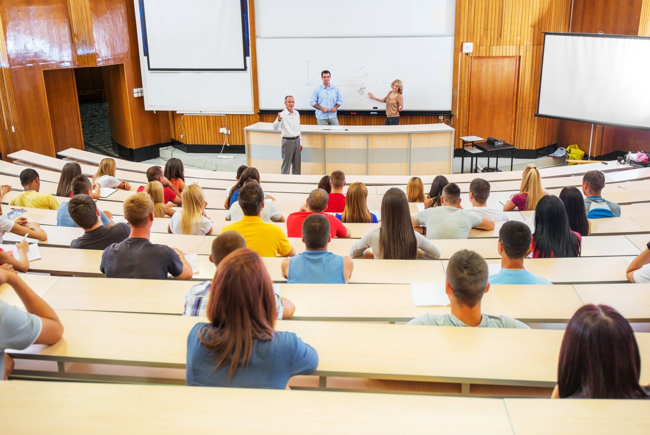 A lecture theatre filled with students 