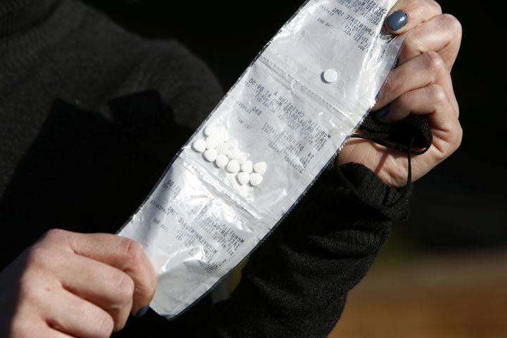 The federal government is providing funding for safer drug programs that distribute pharmaceutical opioids, such as Dilaudid, to people who use substances, as pictured here in Vancouver on April 6, 2020. 