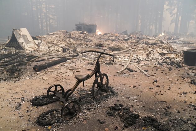 A charred tricycle was about all that was left standing Thursday inside a burnt-to-the-ground home in Bonny Doon, California. Half of California’s 20 most-destructive wildfires have occurred within the last 10 years.