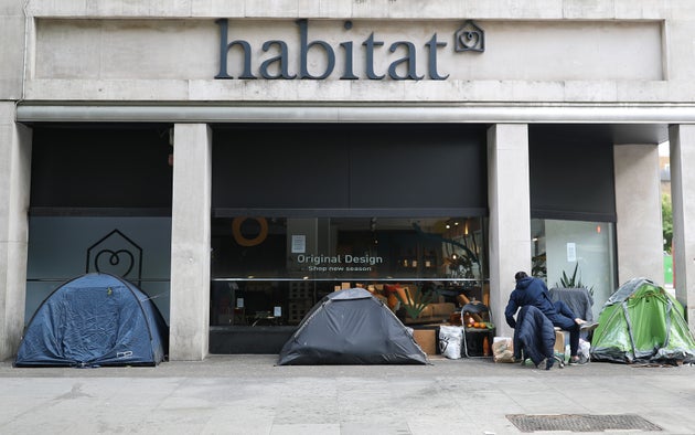 Homeless people's tents erected outside a furniture store in Tottenham Court Road, London.