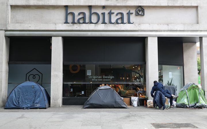 Homeless people's tents erected outside a furniture store in Tottenham Court Road, London.