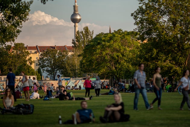 Visitors enjoy warm weather in Mauerpark in Berlin on July 25. On Thursday, Germany recorded its highest...