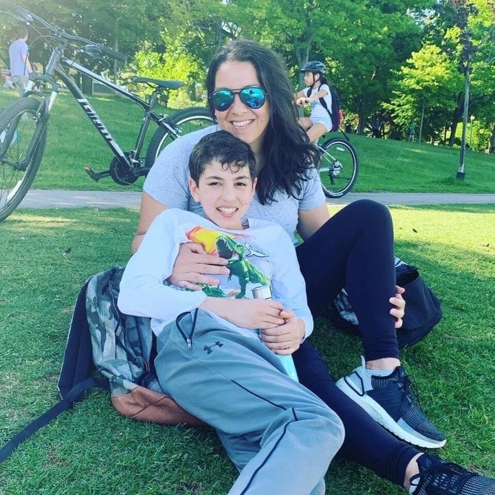 Nada Mokhtar Forbes, who's been dealing with lingering effects of COVID-19 since March, is pictured with her son.