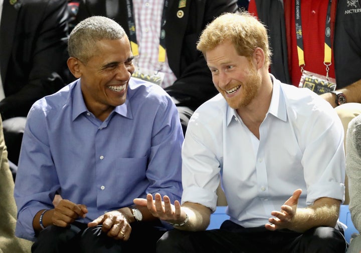 Former President Barack Obama and Prince Harry share a joke at the Invictus Games in 2017.