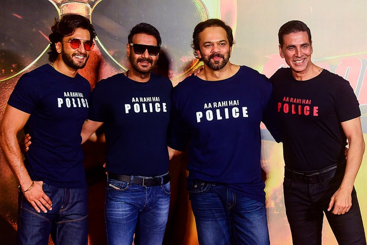 Bollywood actors Ranveer Singh (L), Ajay Devgn (2L) and Akshay Kumar (R) pose for a picture with direcotr Rohit Shetty during the trailer launch of their upcoming action Hindi film 'Sooryavanshi', in Mumbai on March 2, 2020. (