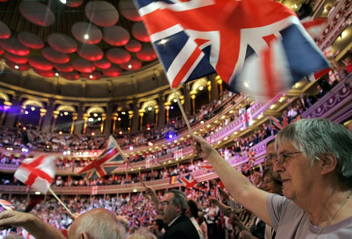Revelers wave Union Flags at the Last Night of the Proms