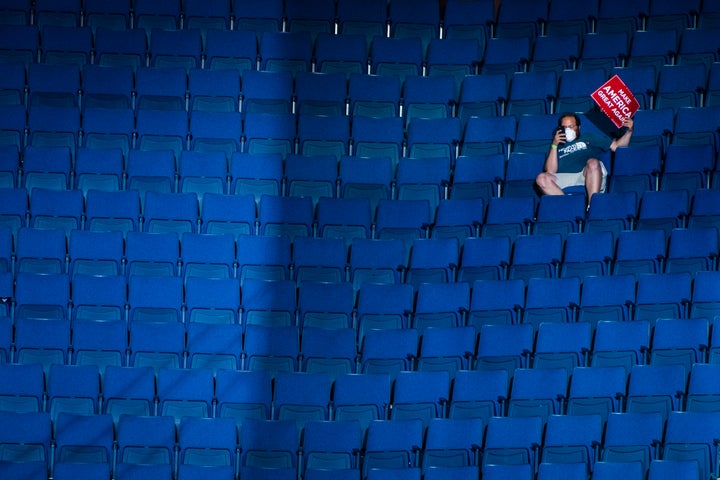 A lone supporter watches as President Trump speaks during a June rally in Tulsa. (Photo by Jabin Botsford/The Washington Post via Getty Images)