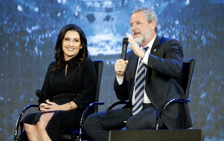 Jerry Falwell Jr., right, gestures as his wife, Becki listens during a town hall at Liberty University in Lynchburg, Va., Wednesday, Nov. 28, 2018. 