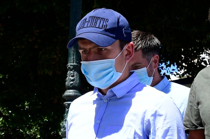 <strong>England player Harry Maguire leaves a court building on the Aegean island of Syros, Greece, on Saturday.</strong>