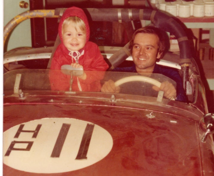 The author receiving an early driving lesson from his dad