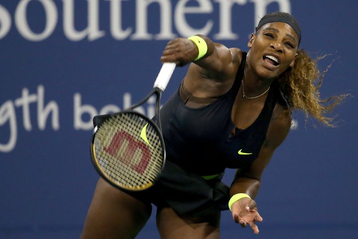 Williams serves to Maria Sakkari of Greece during the Western & Southern Open on Aug. 25 in the Queens borough of New York City.