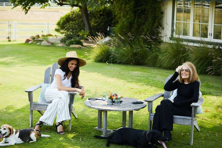 The Duchess of Sussex and Gloria Steinem pictured in Santa Barbara, with Meghan and Harry's dog Pula.