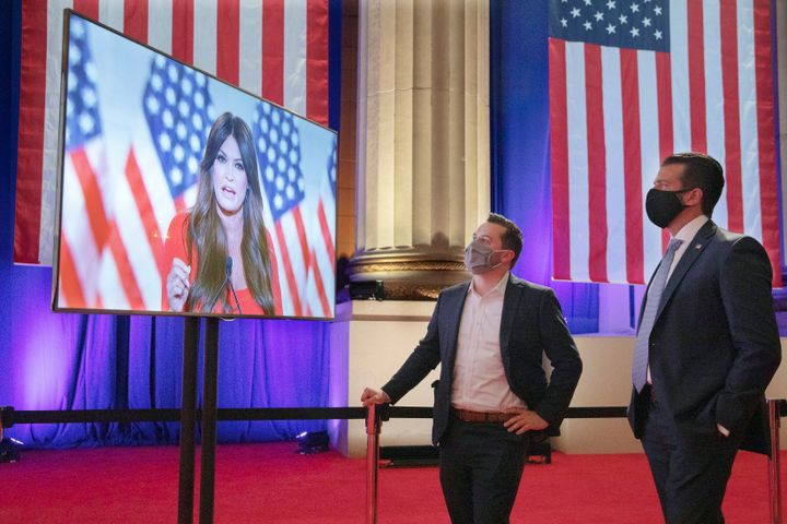 Donald Trump Jr. (right) watches his girlfriend, Kimberly Guilfoyle, a Trump campaign aide, as she records her address for Monday night's Republican National Convention program.