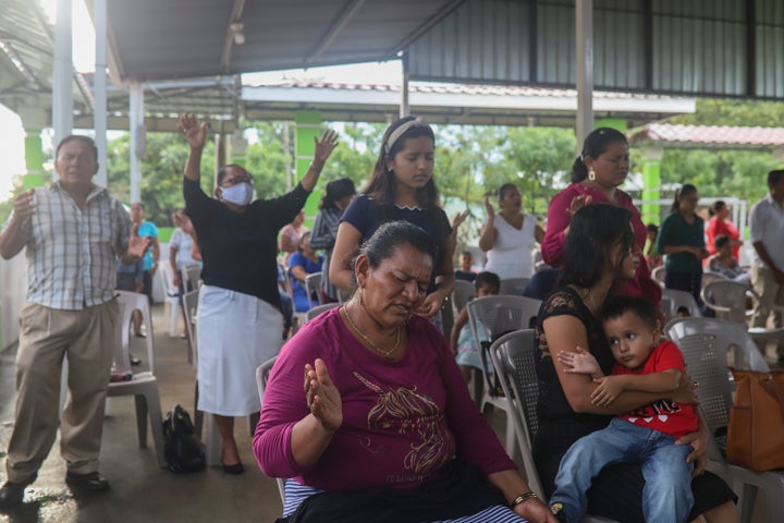 People attend a religious service at the Oasis of Peace evangelical church in Managua, Nicaragua, Sunday, Aug. 16, 2020. 