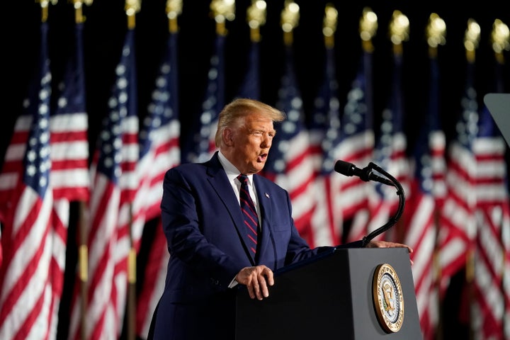 In Trump's remarks Thursday night, the president made it seem like the United States had already moved past the coronavirus pandemic, despite thousands of people testing positive for COVID-19 each day and hundreds dying.