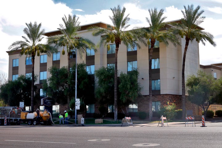 A Hampton Inn is shown Tuesday, July 21, 2020 in Phoenix. Documents obtained by The Associated Press show a private contracto