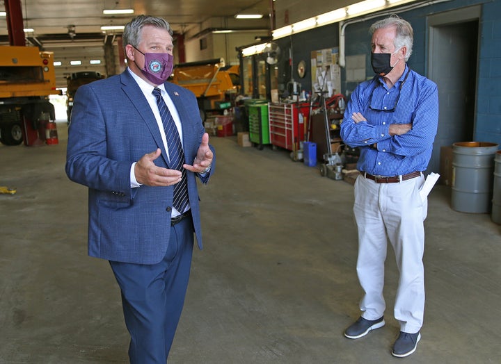 Rep. Richard Neal, right, announces an Environmental Protection Agency grant for the city of Chicopee on Aug. 13. Neal is counting on voters to reward him for the perks offered by his seniority in Congress.