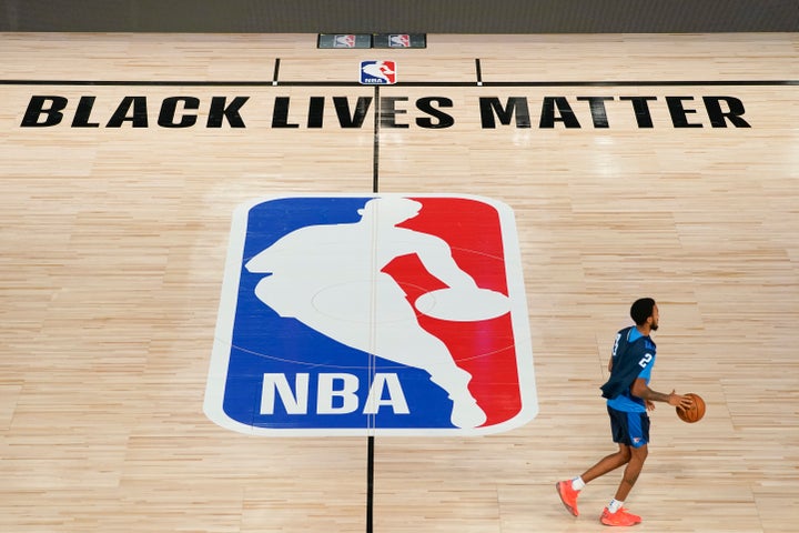 Oklahoma City Thunder's Terrance Ferguson takes the court for practice in an NBA basketball arena on Aug. 28, 2020, in Lake Buena Vista, Florida. 