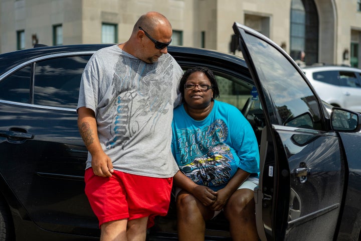 David Frantz and Pamela Elliott wait outside a shelter set up by the American Red Cross at the Veterans Memorial Building in Cedar Rapids on Aug. 16, 2020. Frantz and Elliott lost their apartment in a rare derecho that lifted the roof from their unit. Elliott was inside at the time and took shelter in a closet with her 4-month-old grandson.