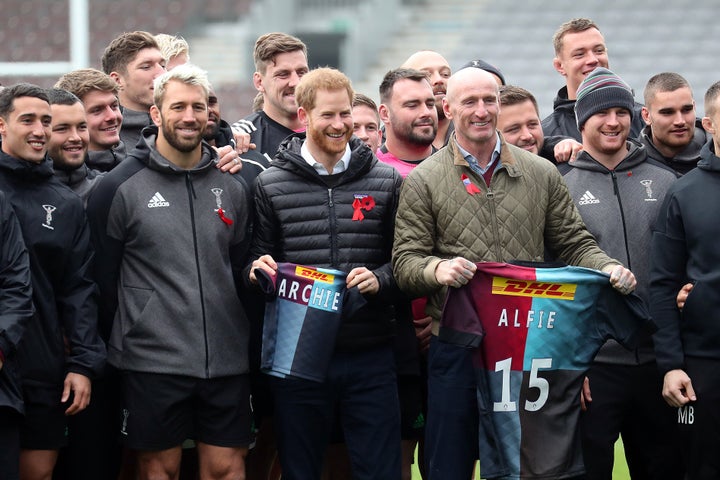 Prince Harry with former Wales rugby captain, Gareth Thomas, right, and Harlequins player Chris Robshaw, left, during a Terrence Higgins Trust event ahead of National HIV Testing Week in London on Nov. 8, 2019.