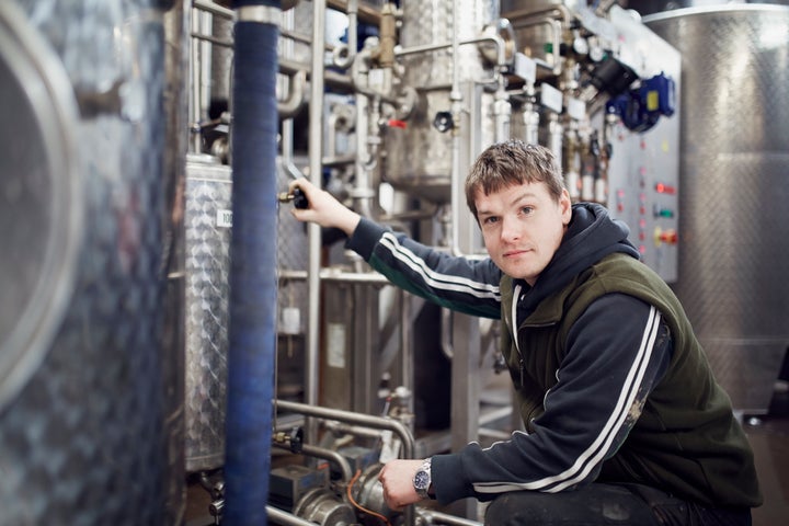 Workers at a distillery