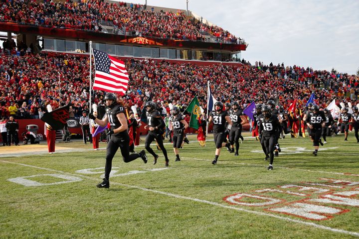 Iowa State players take the field at Jack Trice Stadium before a game in 2019.