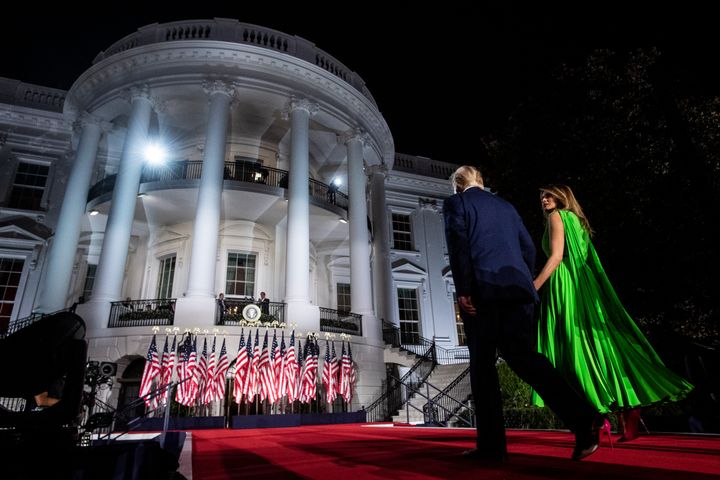 President Donald Trump and first lady Melania Trump at the White House on the last night of the Republican National Convention on Aug. 27. New polls gauge voters' reactions to the RNC and the Democratic convention preceding it.