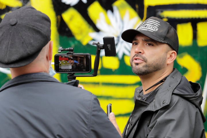 In this June 15, 2020, file photo, Joey Gibson takes part in a live broadcast during a protest in Seattle. Portland shooting victim Aaron Danielson was reportedly a good friend of Gibson's.