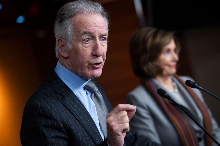 House Ways and Means Chairman Richard Neal (D-Mass.) speaks as his ally, House Speaker Nancy Pelosi (D-Calif.), looks on. His win in Tuesday's primary dealt a major defeat for the ascendant activist left.