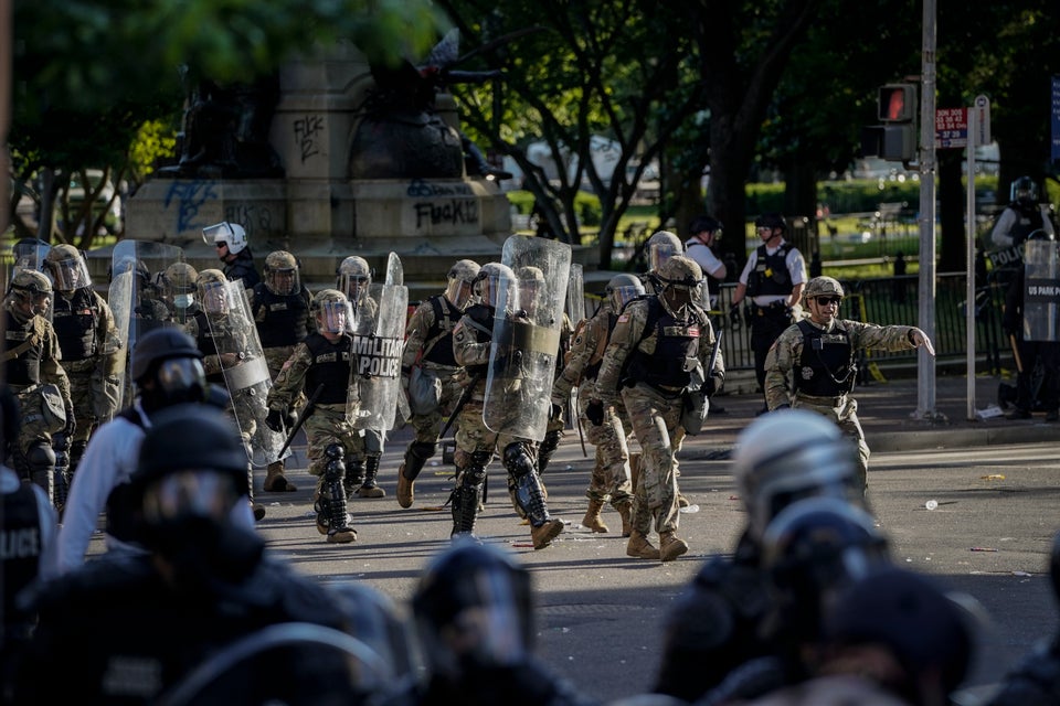 Law enforcement clear protesters from Lafayette Park in Washington ahead of a presidential photo-op. 