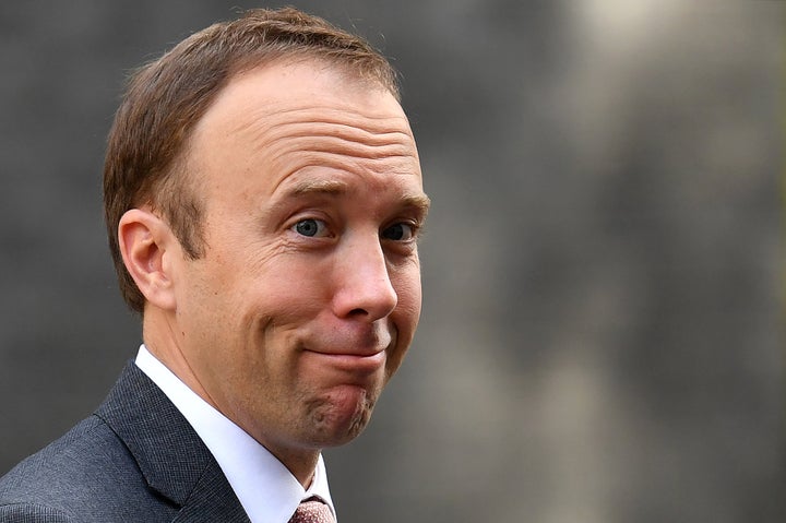 Health secretary Matt Hancock reacts as he leaves from 10 Downing Street in central London on Wednesday