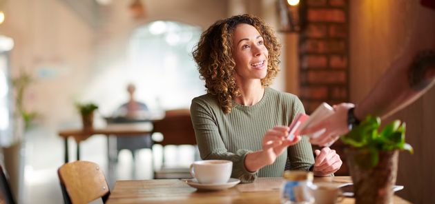 paying by contactless in a cafe