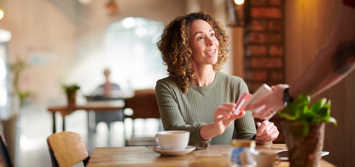 paying by contactless in a cafe