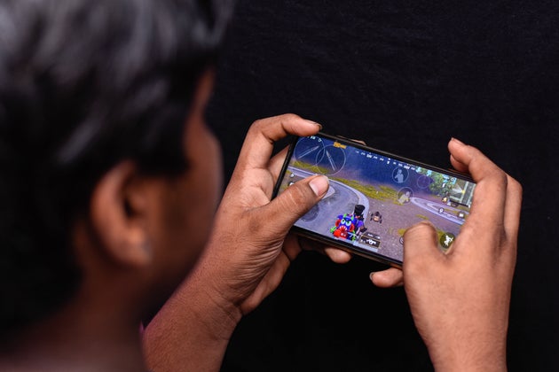 A boy playing PUBG on his