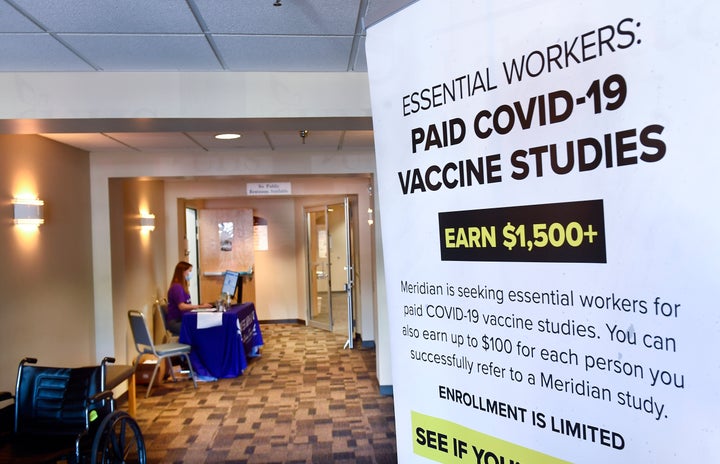 A poster seeking volunteers for a possible COVID-19 vaccine study in Binghamton, New York, in July. The FDA's commissioner ha