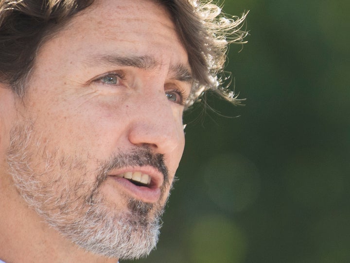 Prime Minister Justin Trudeau speaks to reporters during a news conference following a visit to the National Research Council of Canada (NRC) Royalmount Human Health Therapeutics Research Centre facility in Montreal on Aug. 31, 2020.