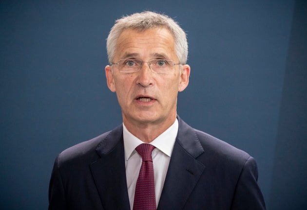 NATO Secretary General Jens Stoltenberg talks to the media after a meeting with German Chancellor Angela Merkel in the Chancellery in Berlin, Germany, Thursday, Aug. 27, 2020. (Michael Kappeler/Pool via AP)