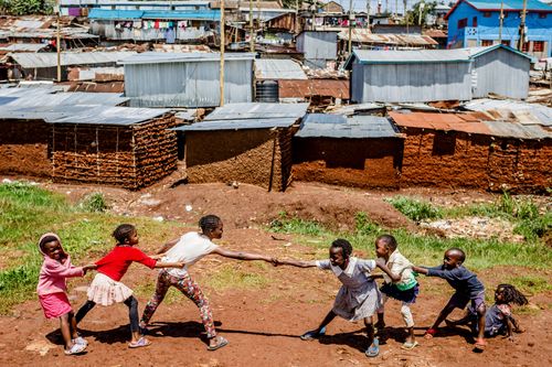 Along the Motione River in Kibera  a neighborhood in Nairobi  the riverbank where children used to play has been heavily polluted. The soil along the riverbank is often dug up by residents and used to build houses in the area. Above: Nov. 9, 2017 | Below: July 29, 2020