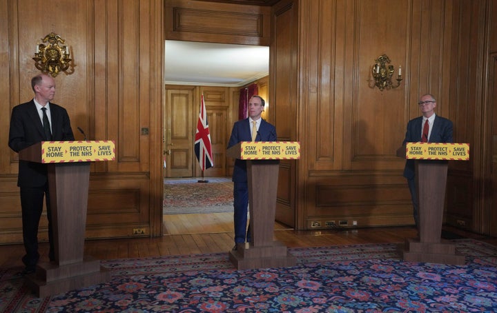 Britain's Chief Medical Officer, Chris Whitty, Foreign Secretary Dominic Raab and Chief Scientific Adviser Sir Patrick Vallance during a media briefing on coronavirus